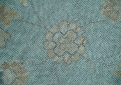 Blue and Beige Traditional Floral Hand Knotted Wool Rug.