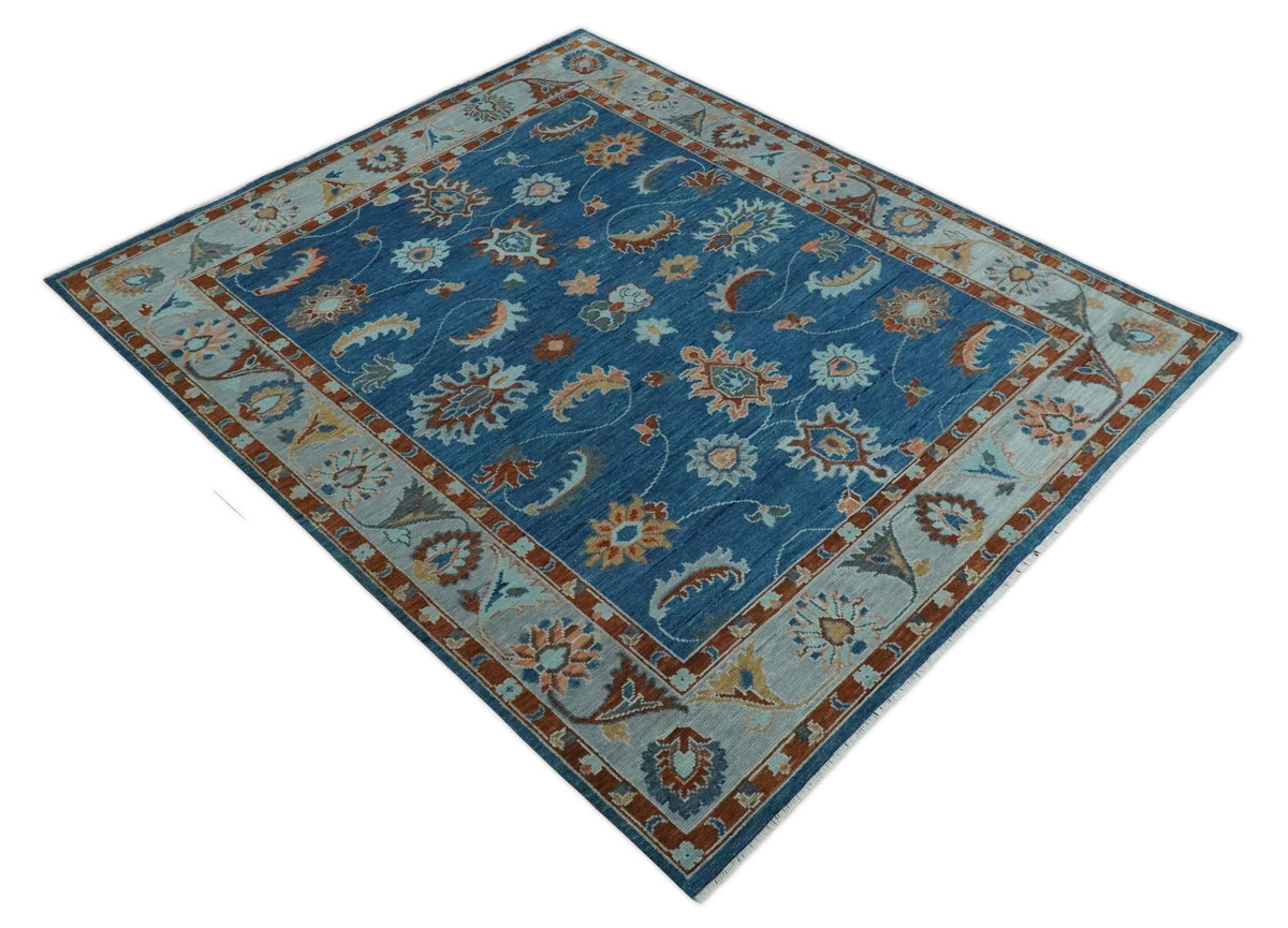 Blue And Brown Hand Knotted Floral Oushak Wool Area Rug.