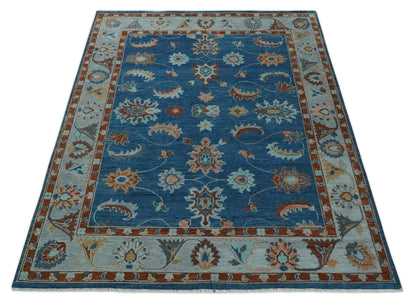 Blue And Brown Hand Knotted Floral Oushak Wool Area Rug.