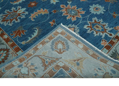 Blue And Brown Hand Knotted Floral Oushak Wool Area Rug.