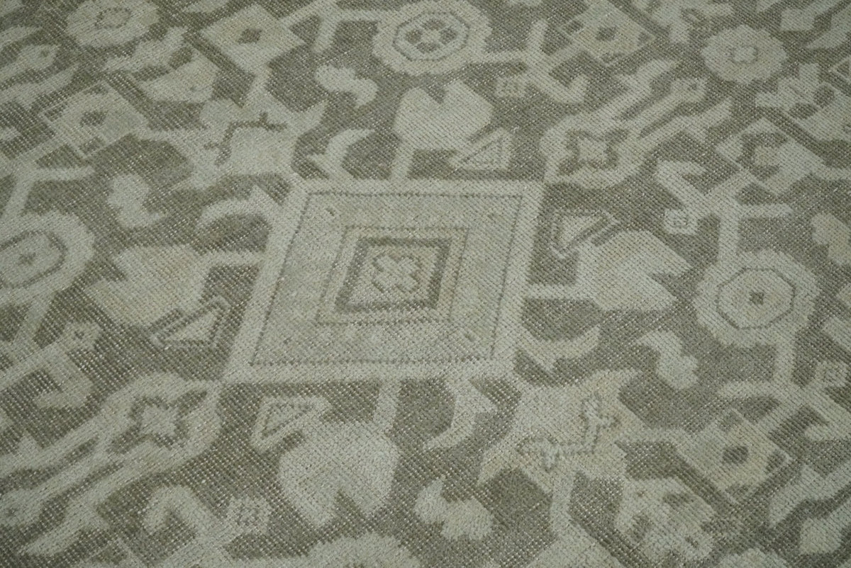 Brown and Beige Hand Knotted Wool Low Pile Vintage Area Rug.
