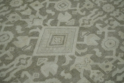 Brown and Beige Hand Knotted Wool Low Pile Vintage Area Rug.