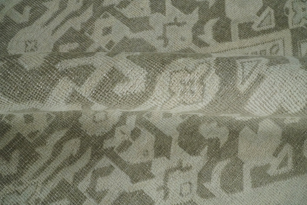 Brown and Beige Hand Knotted Wool Low Pile Vintage Area Rug.