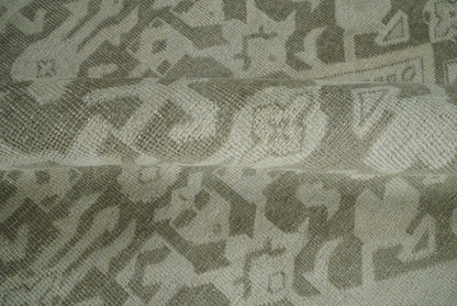 Brown and Beige Hand Knotted Wool Low Pile Vintage Area Rug.