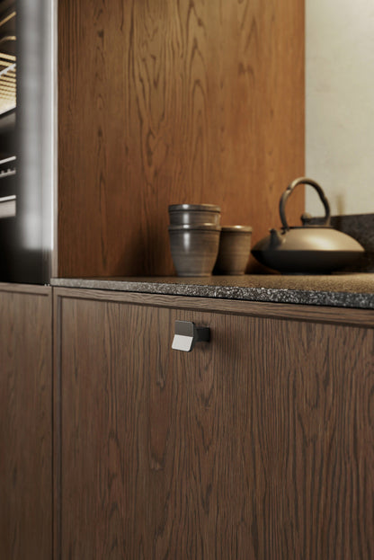 Gun Metal "Vis a Vis" Cabinet Knob and Drawer Pulls.