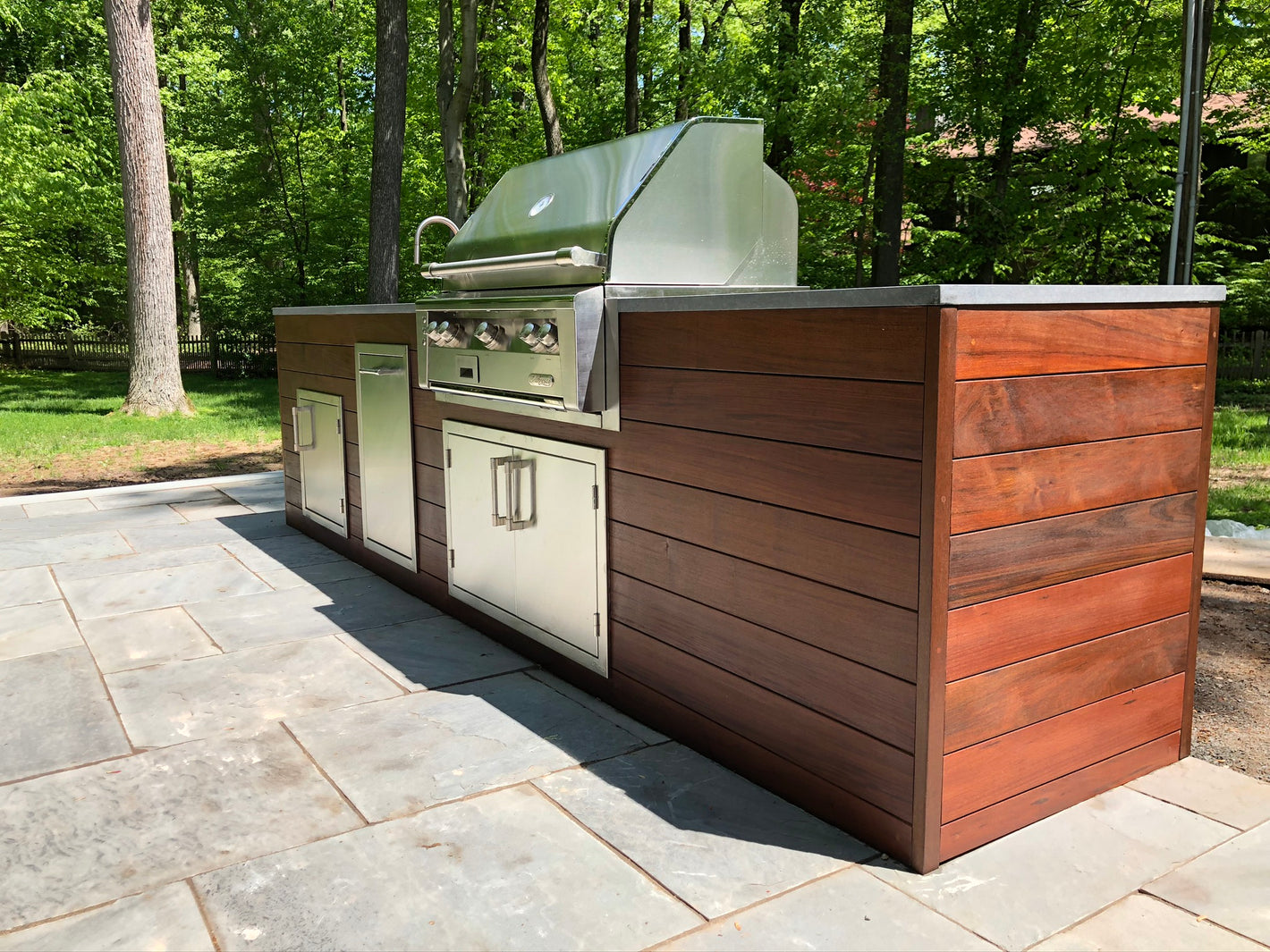 Outdoor ipe kitchen with full storage, grill and sink created by TCSC