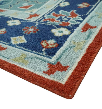 Custom Made Rust, Blue and Silver hand knotted Traditional Heriz wool area rug.