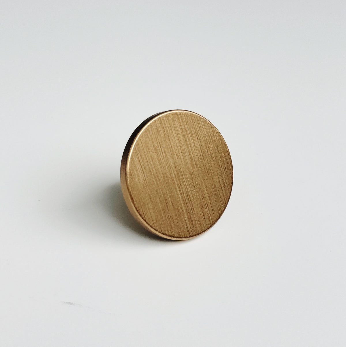 Round Brushed Bronze "Plato" Flat Cabinet Knob.