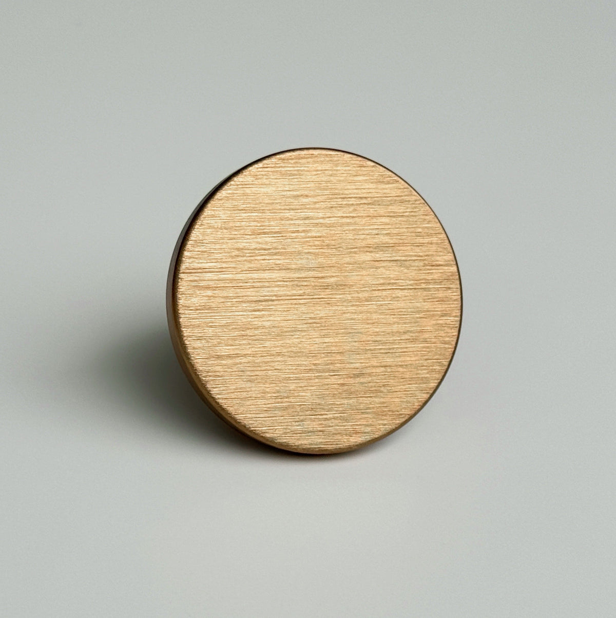Round Brushed Bronze "Plato" Flat Cabinet Knob.