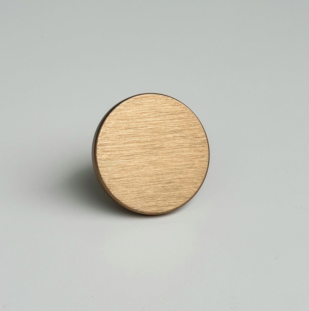 Round Brushed Bronze "Plato" Flat Cabinet Knob.