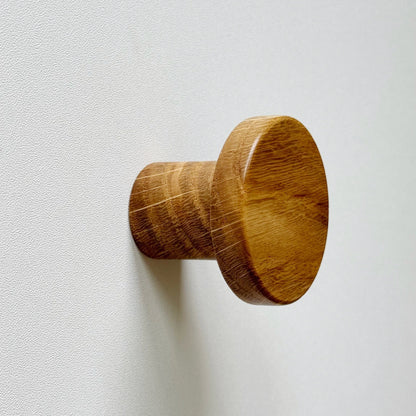 Modern "Pinta" Round Wall Hook in Lacquered Oak.