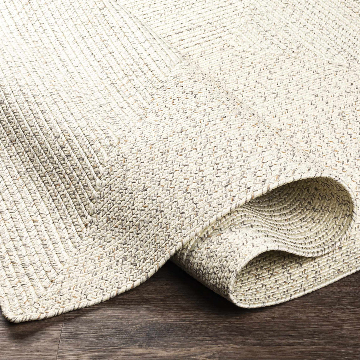 Beige Braided Faux Jute Outdoor Rug.
