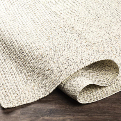 Beige Braided Faux Jute Outdoor Rug.