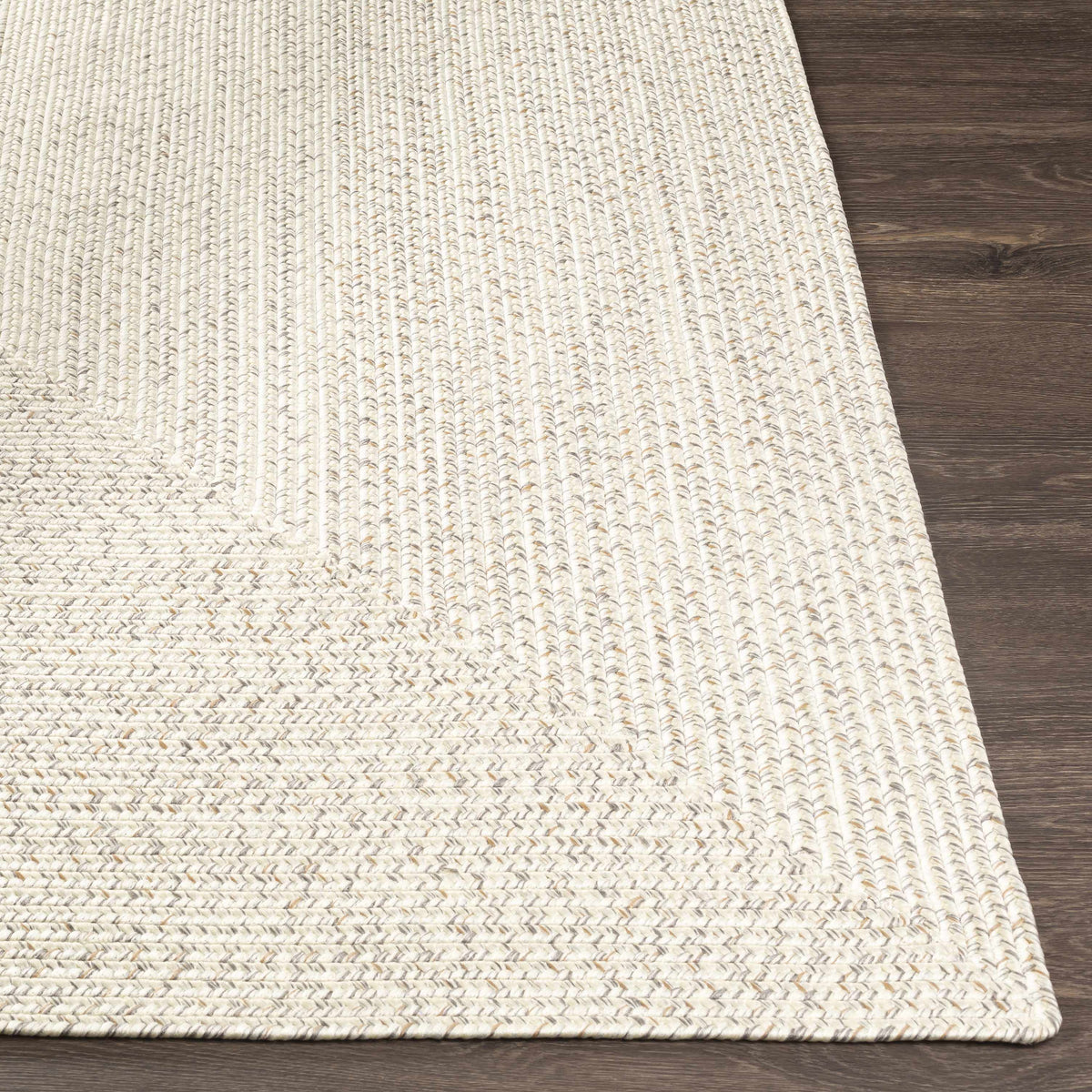 Beige Braided Faux Jute Outdoor Rug.