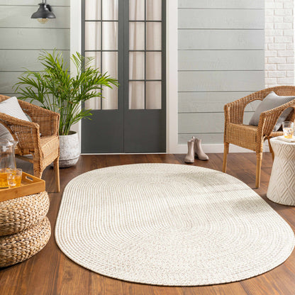 Beige Braided Faux Jute Outdoor Rug.