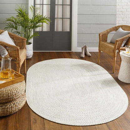 Beige Braided Faux Jute Outdoor Rug.