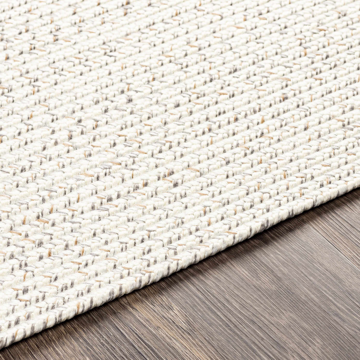 Beige Braided Faux Jute Outdoor Rug.