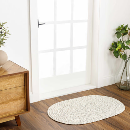 Beige Braided Faux Jute Outdoor Rug.