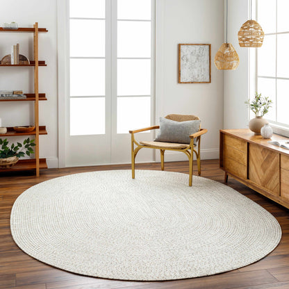 Beige Braided Faux Jute Outdoor Rug.
