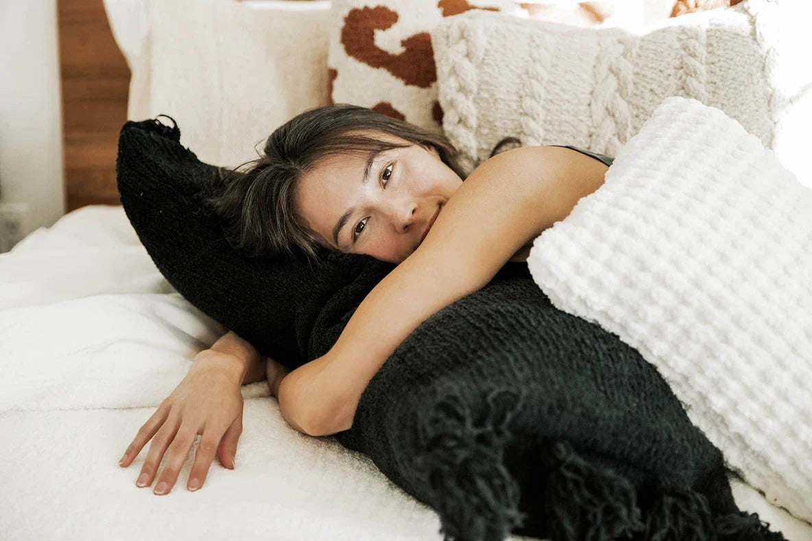 Braided Pom Pom Lumbar Pillow.