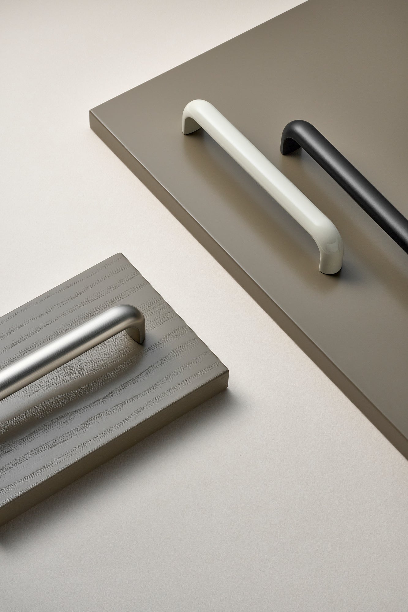 Satin Steel "Vibe" Cup Knob and Drawer Pull.