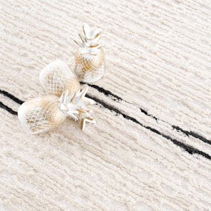 Riad Black Striped White Rug with Tassels