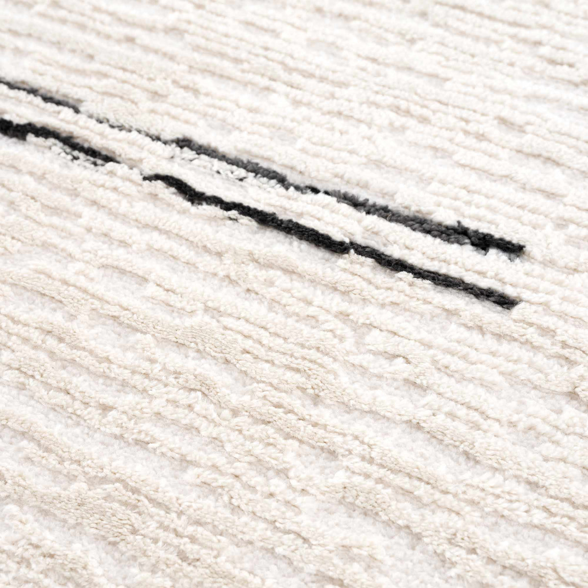 Riad Black Striped White Rug with Tassels