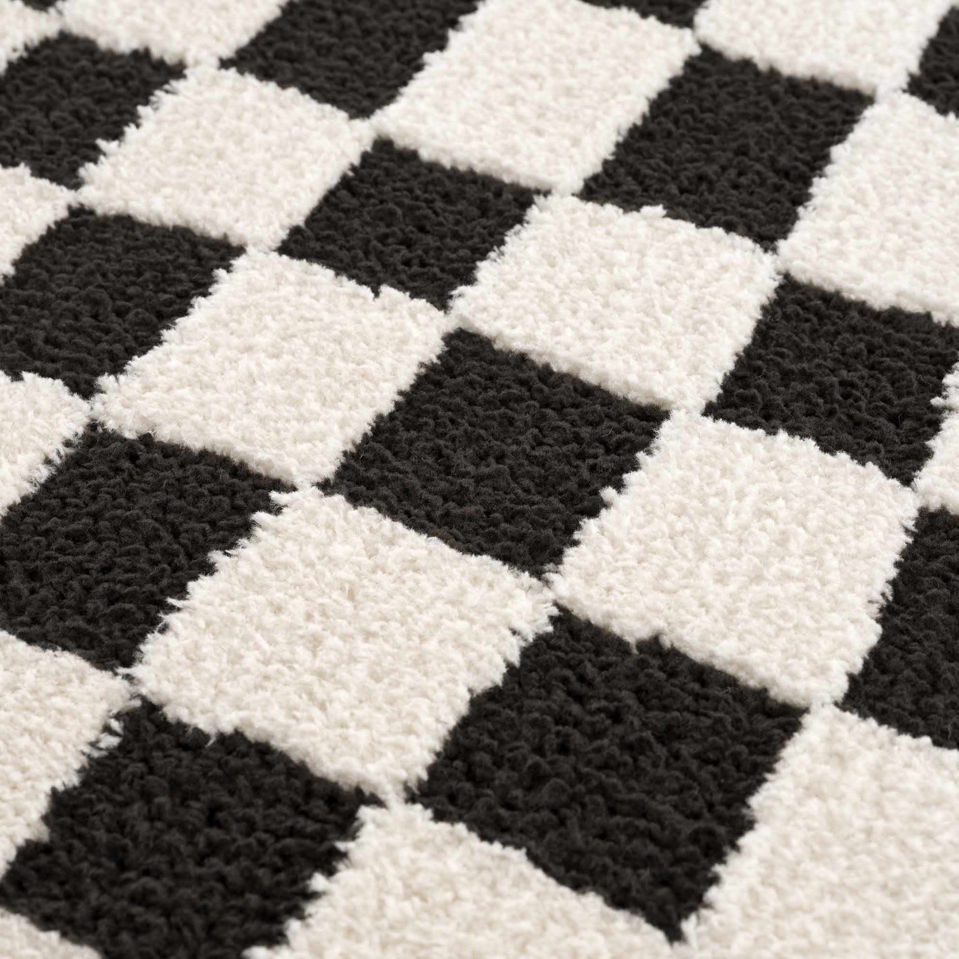 Lajos Black & White Checkered Area Rug.