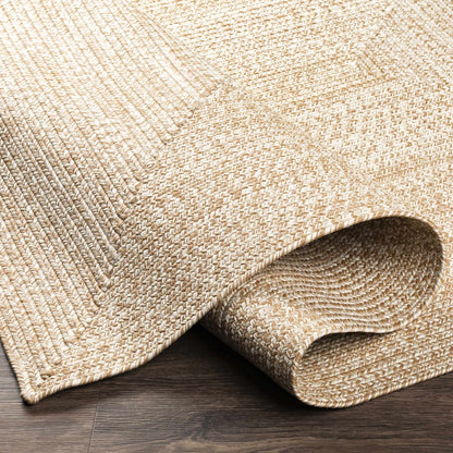 Cream Braided Faux Jute Outdoor Rug.