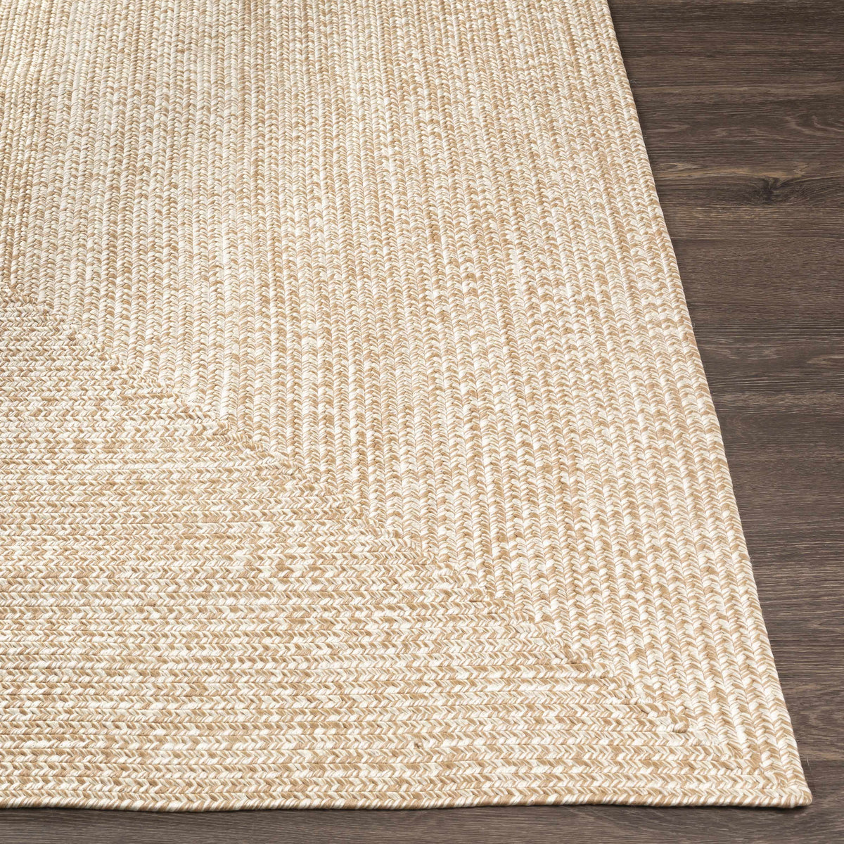Cream Braided Faux Jute Outdoor Rug.