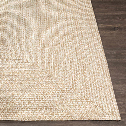 Cream Braided Faux Jute Outdoor Rug.