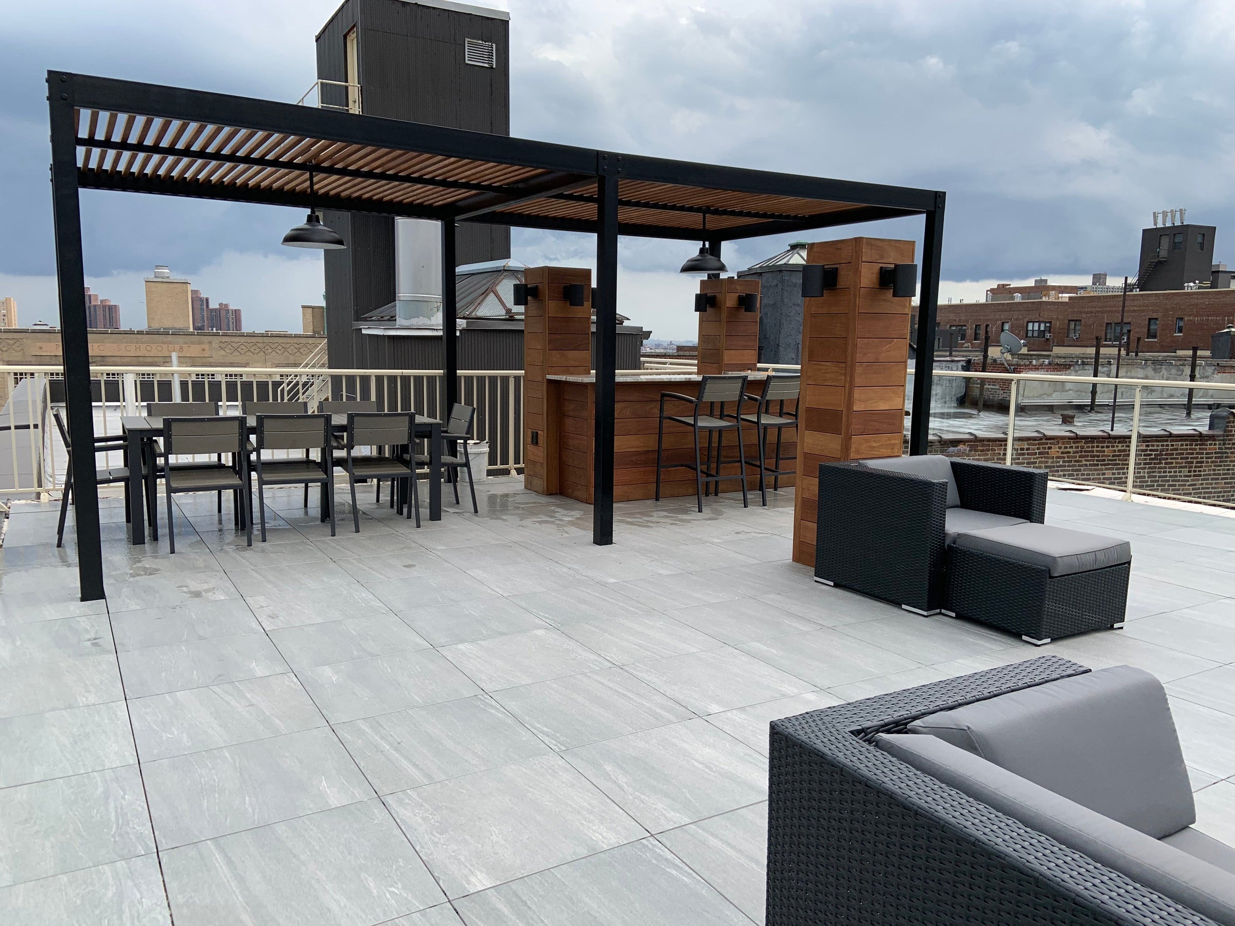 Outdoor pergola black aluminum frame with wood perlins created by TCSC