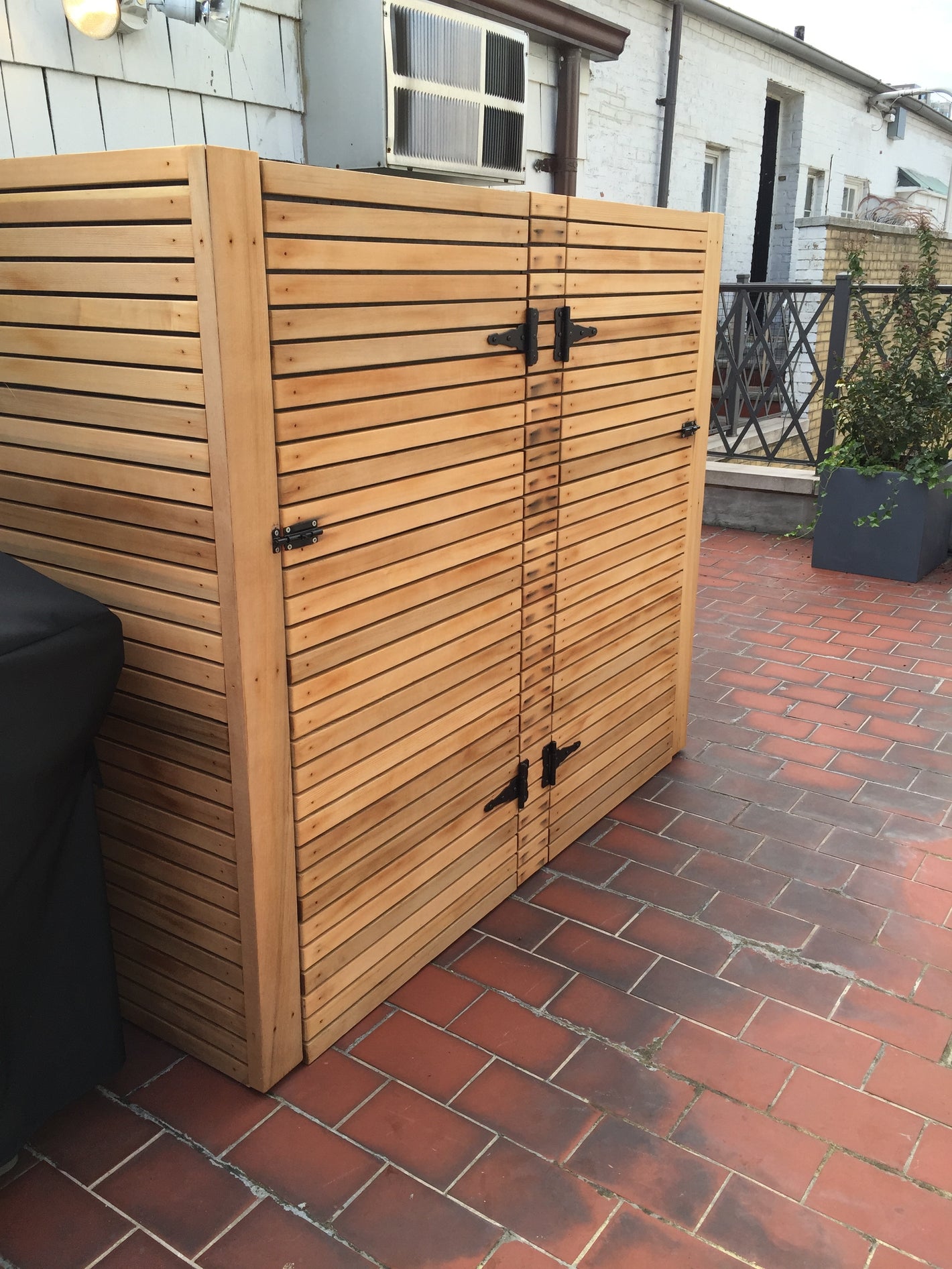 Back yard wood storage unit created by TCSC