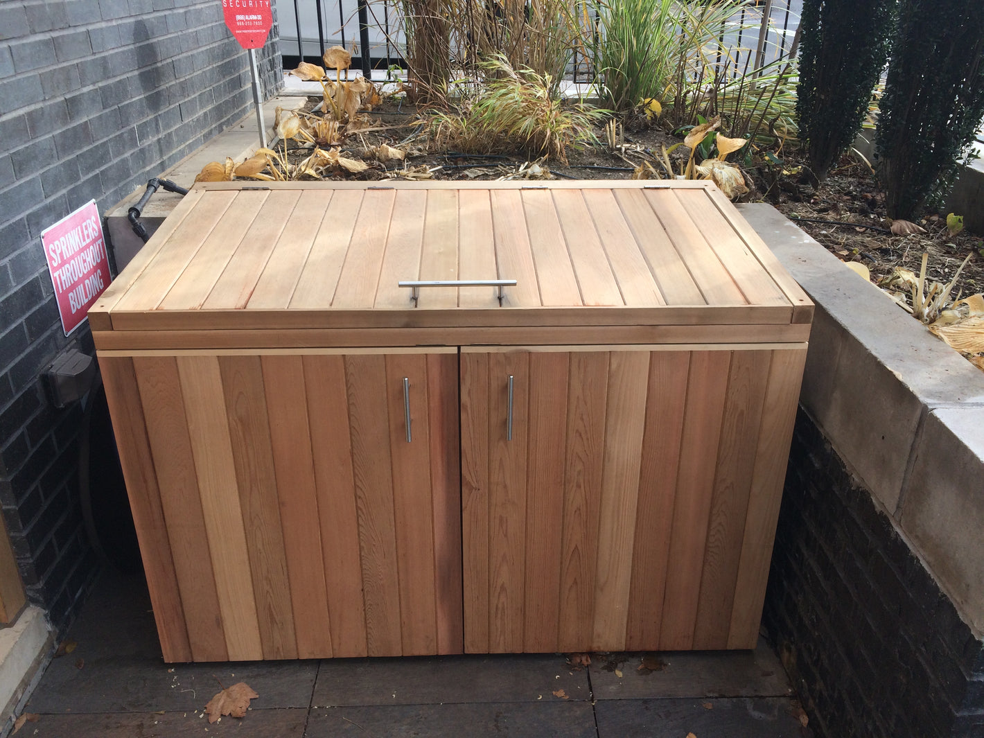 Outdoor trash enclosure created by TCSC 