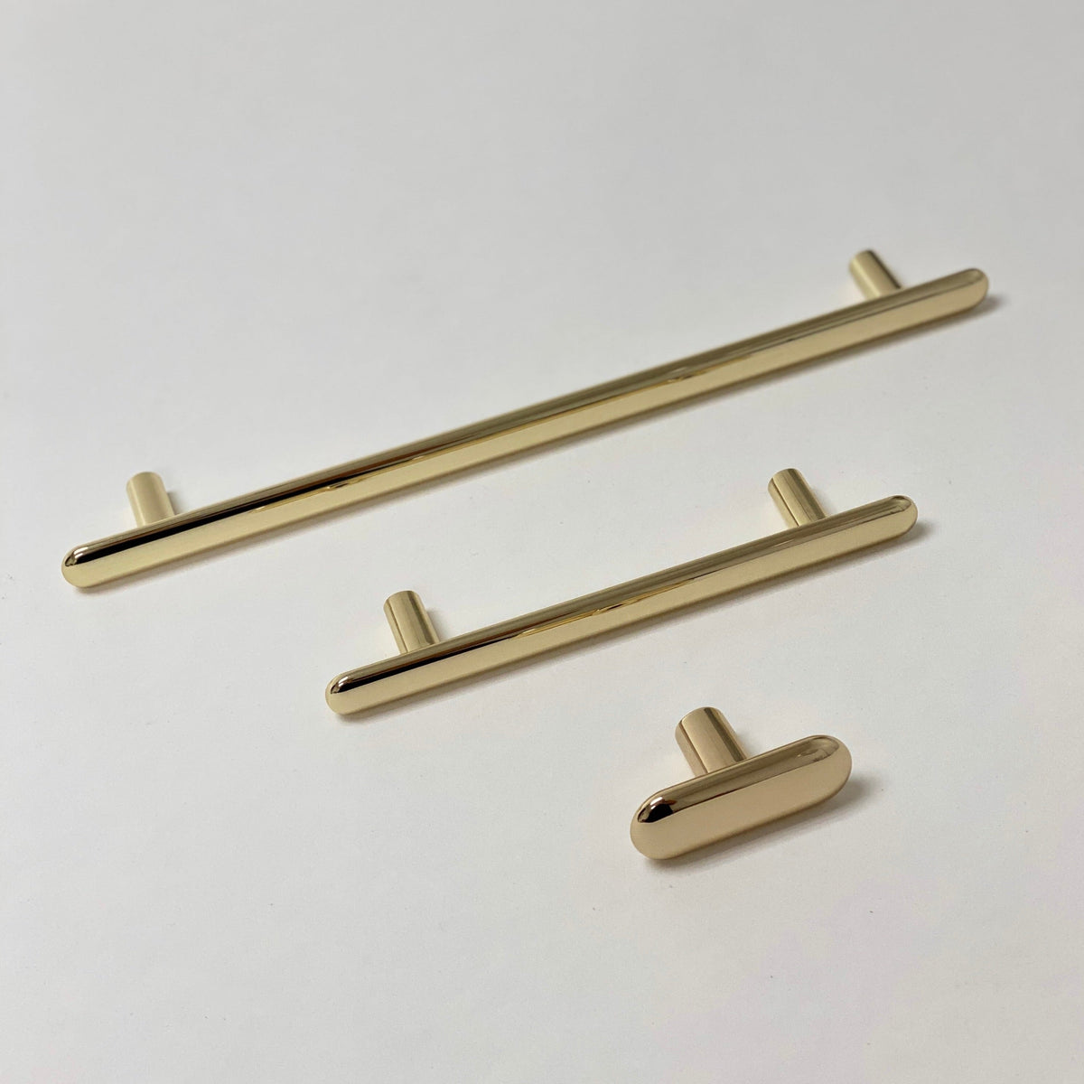 Polished Brass "Chandler" Cabinet Knobs and Drawer Pulls.