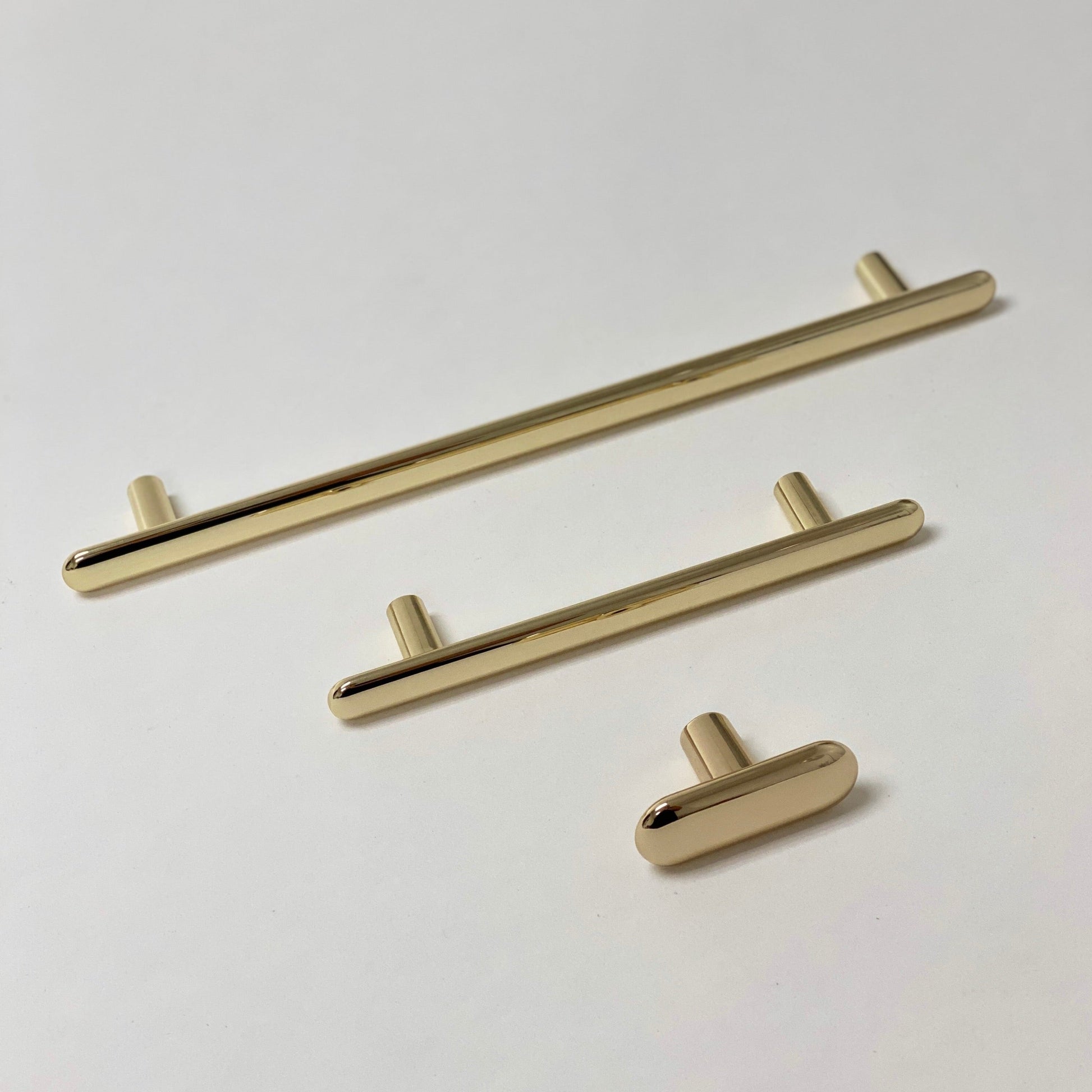 Polished Brass "Chandler" Cabinet Knobs and Drawer Pulls.