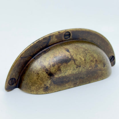 Drawer Cup Pulls "Amalfi" in Worn Brass.
