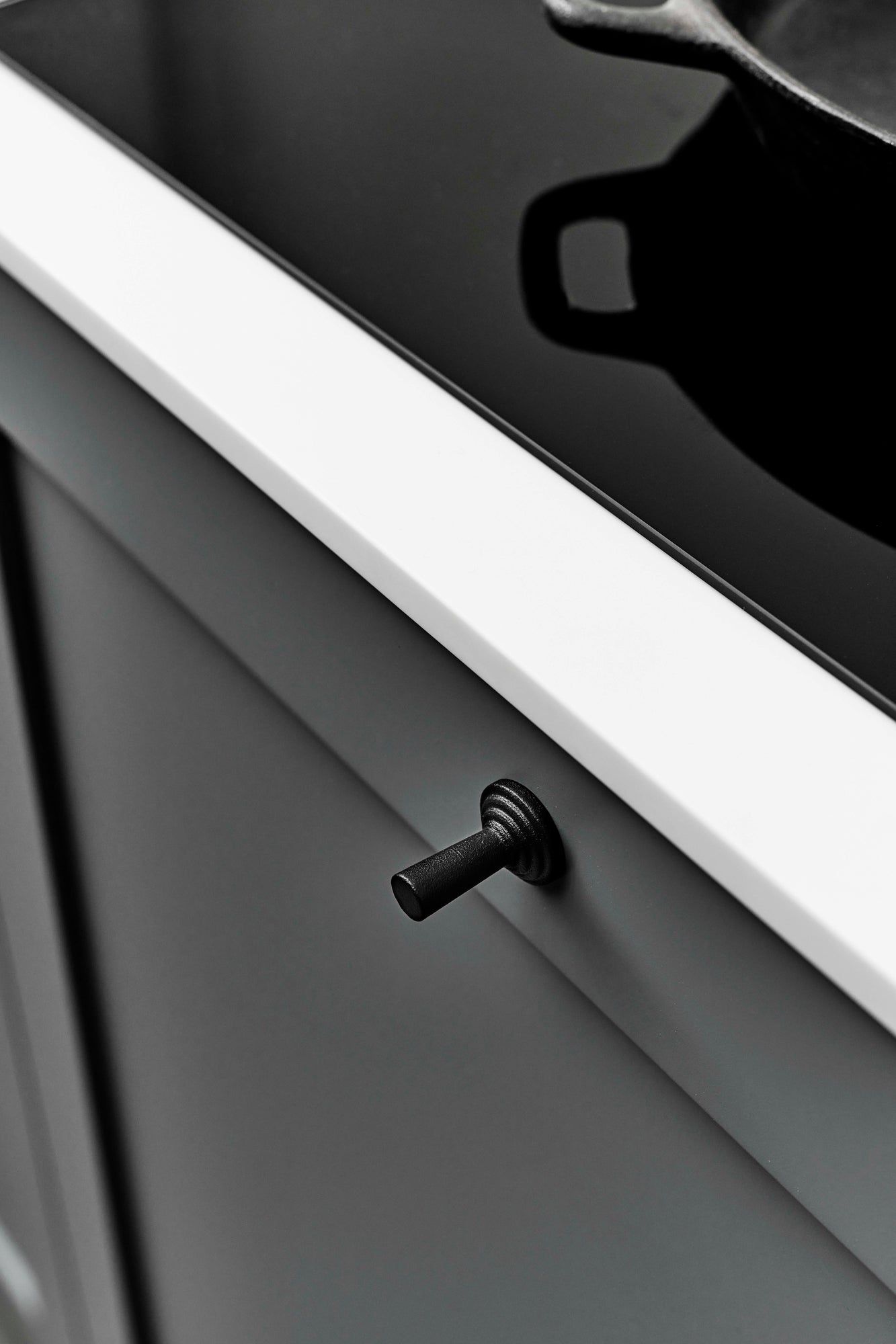 Matte Black "Motion" Knob and Drawer Pull.