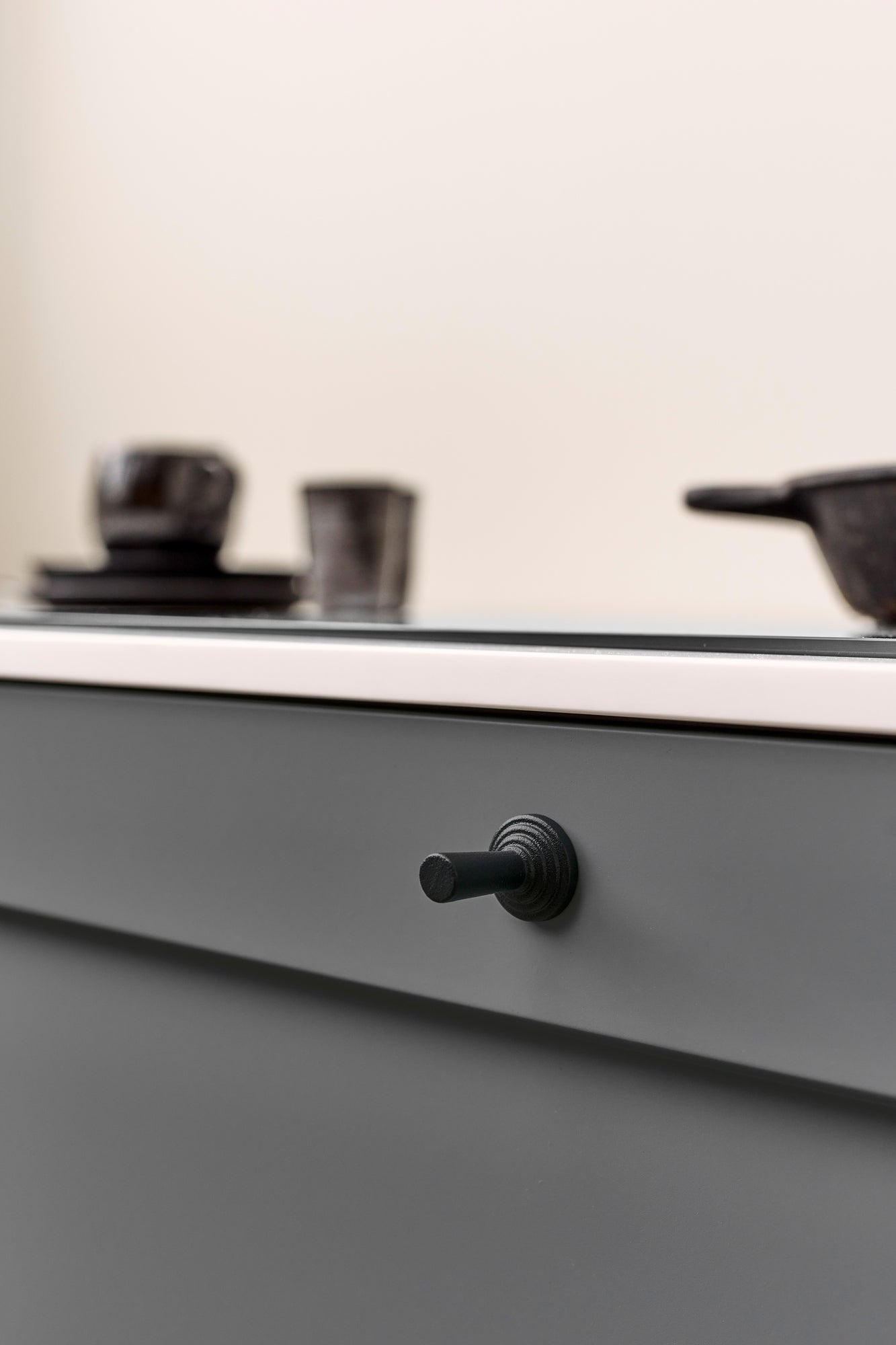 Matte Black "Motion" Knob and Drawer Pull.
