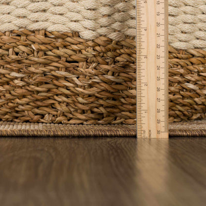 Kuval Checkered Brown Outdoor Rug.