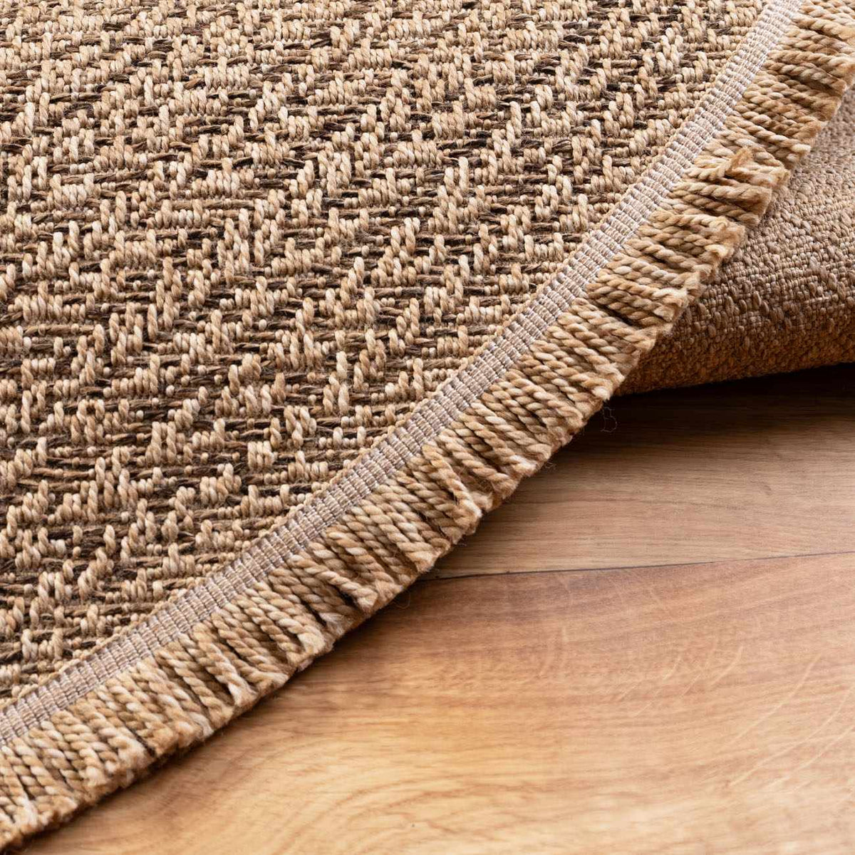 Fumiya Faux Jute Area Rug