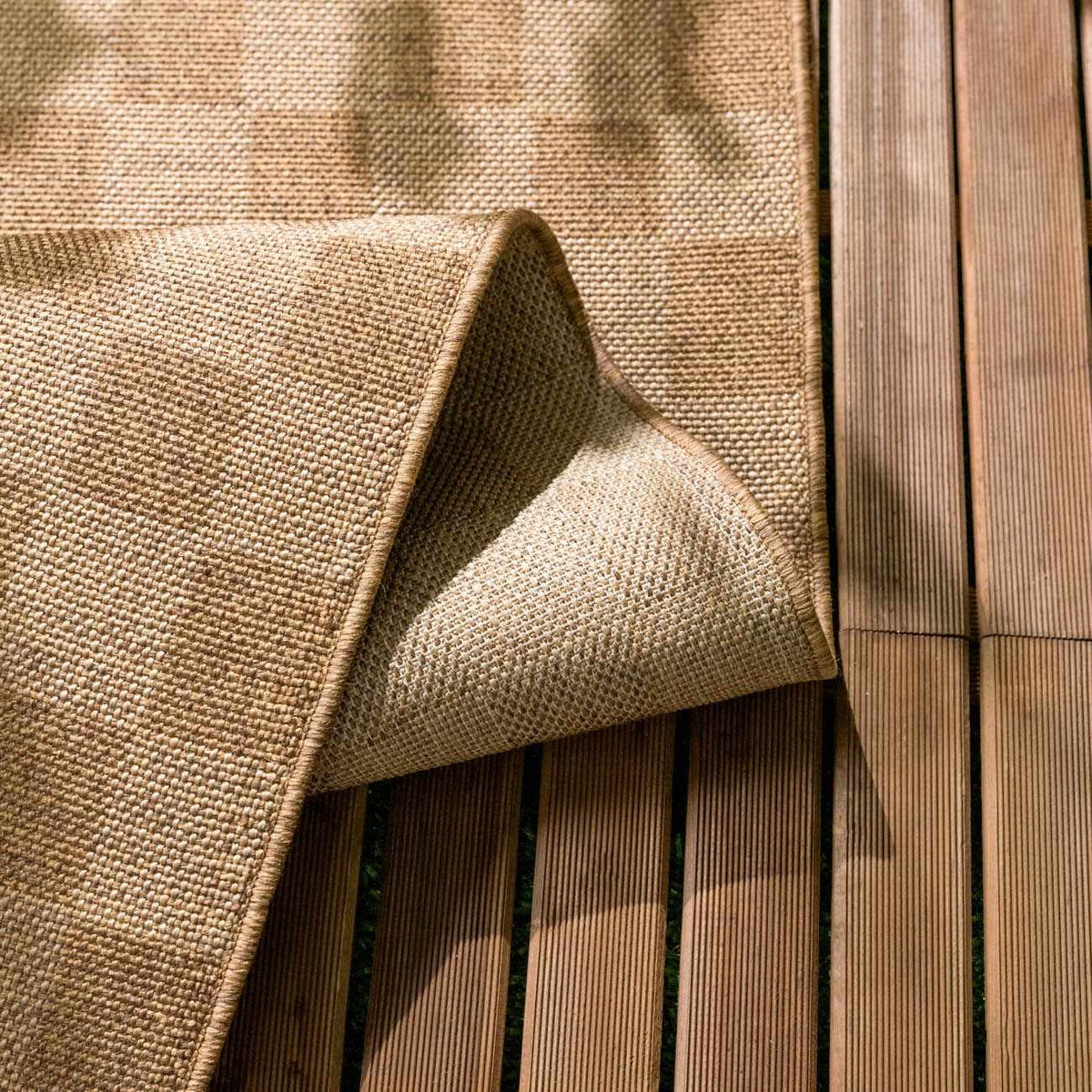 Kuval Checkered Brown Outdoor Rug.