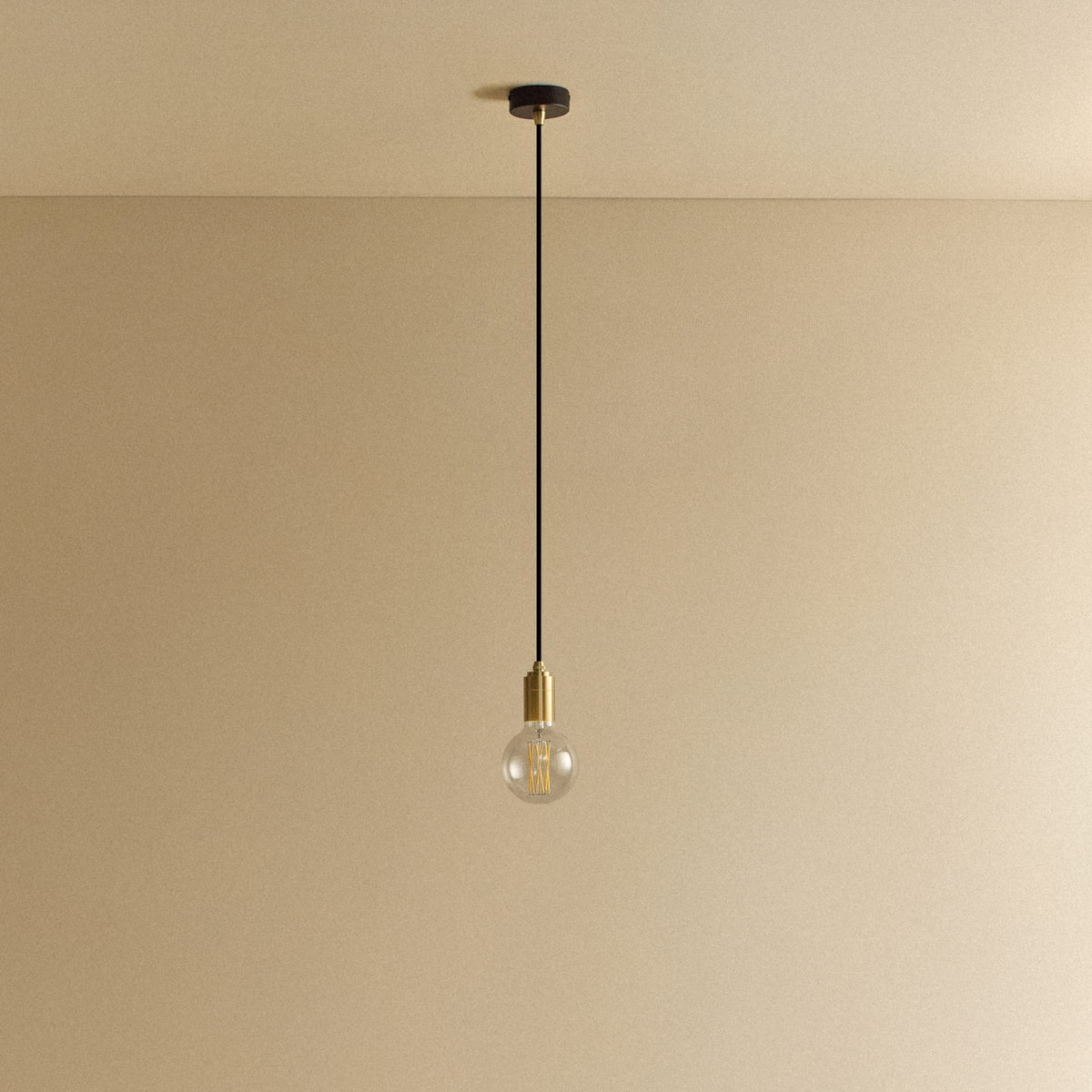 Elva Pendant Light Non-Tinted in Brass.