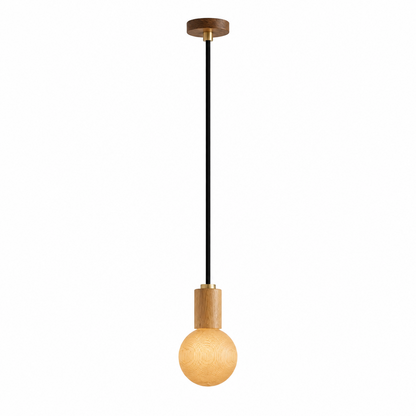Minimalist pendant light with a glowing bulb on a beige background