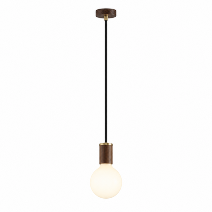Pendant light with a single bulb hanging against a beige wall