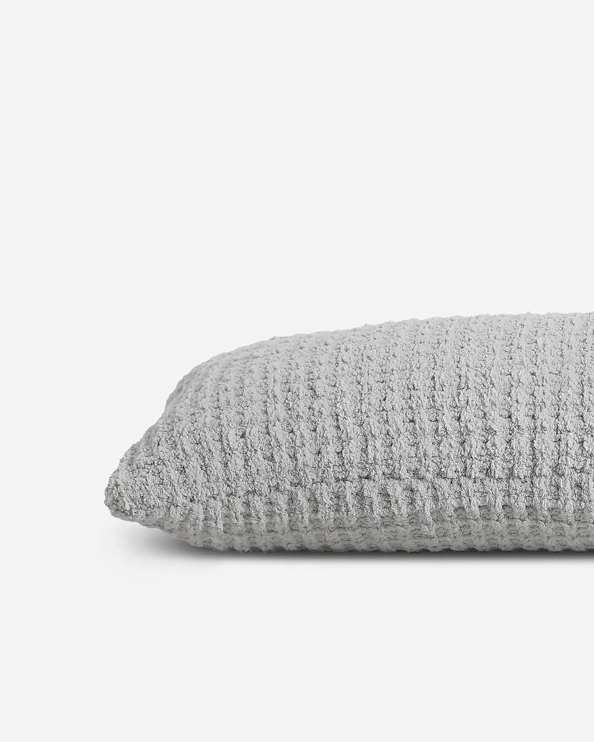 Snug Waffle Lumbar Pillow.