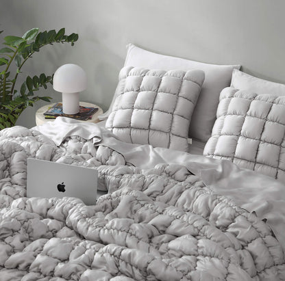 Silky Lyocell Puff Throw Pillow.