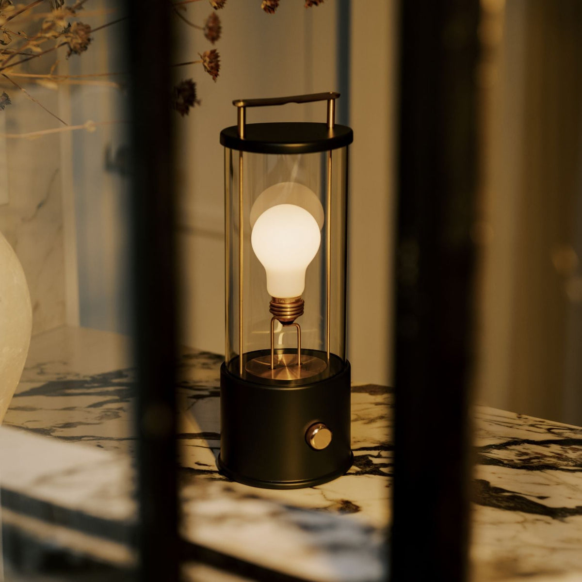 The Muse Portable Lamp in Hackles Black.
