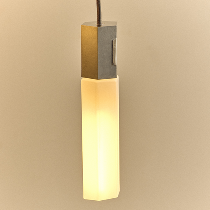 Basalt Single Pendant in Stainless Steel.