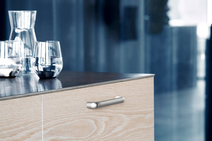 Satin Steel "Vibe" Cup Knob and Drawer Pull.